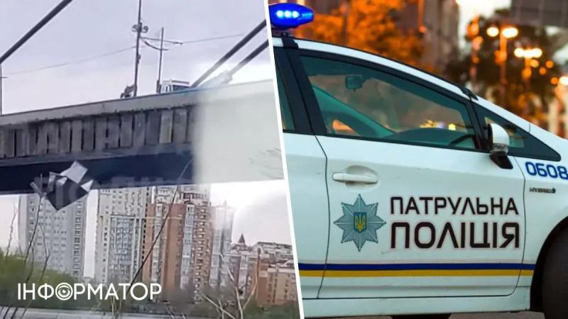 В Киеве водитель выбросил в Днепр железный гараж из грузовика: видео