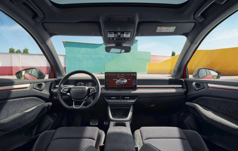 Черный глянец и 211 л.с.: Škoda показала электрический кроссовер Epiq Sportline
